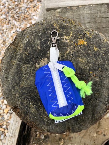 Small handy pouch that fits keys, poop bags and credit cards. Useful for dog walks, going out for a jog, or going to the gym.